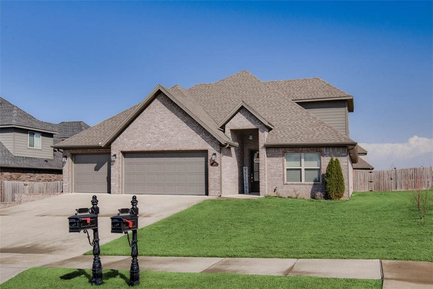 This Bentonville home offers a fantastic location with easy access to trails and community amenities. Bike trails to Osage & Creekside Parks are across the street, while the neighborhood features a pool and playground. A short drive to the Activity Center, and 15 mins to Walmart & I-49, it blends recreation and convenience. Located in the Bentonville school district, it sits on a corner lot with a privacy-fenced backyard and covered patio. Inside, 4 beds and 3 baths feature wood floors, tall beamed ceilings, and a fireplace. The open floor plan includes a kitchen with gas cooktop, granite counters, pantry, eat-at bar, and dining space. The primary suite has wood floors, beamed ceilings, a walk-in closet, shower, tub, and double vanity. A 2nd bed and bath are on the main floor. Upstairs, a bed, bath, and bonus room/4th bed with walk-in closet. Refrigerator, washer, and dryer included.