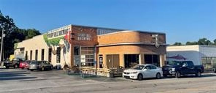 Historic Downtown Investment Opportunity | 5 Points District-Located in the heart of Siloam Springs within the desirable 5 Points District, this unique historic commercial building offers character, stability, and modern upgrades. The property is in excellent condition and has been thoughtfully maintained while preserving its historic charm. Major improvements were completed in 2017, incl a new TPO roof and new water, electric, and sewer connections to the city. The building features central heat & air, along with two mini-split systems, ensuring efficient climate control throughout. The property includes four rental units, all currently leased, providing immediate income. A well-established and successful coffee shop, Pour Jon’s, is a current tenant with a long-term lease in place through 12/31/2035, adding significant value and stability to this investment.
This is a rare opportunity to own a fully leased, income-producing historic building in one of downtown Siloam Springs’ most vibrant and walkable districts.