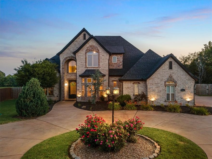 Nestled in a serene cul-de-sac, this home offers a rare blend of tranquility and convenience in the heart of Northwest Arkansas. It's the epitome of luxury living, perfectly situated for those who enjoy both indoor elegance and outdoor entertainment. This residence boasts an impressive entrance with a striking staircase, 5 bedrooms, and 4.5 bathrooms. The kitchen is a culinary masterpiece, complemented by dual laundry facilities, a game room, and a stylish wet bar area leading out to the inviting pool. There's even a dedicated workout space and an ample amount of cozy corners for relaxation and socializing. The saltwater pool, equipped with a heater for year-round enjoyment, is complemented by a ready-to-install hot tub hookup on the spacious back patio. Positioned for easy access to everything Northwest Arkansas has to offer, this is more than just a home—it's a sanctuary for those seeking a perfect balance of luxury and lifestyle.