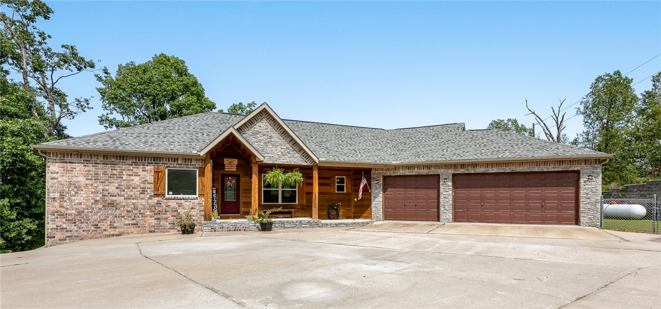 Beautiful Views!! Just picture yourself relaxing on your deck overlooking your in-ground salt water pool and Beaver Lake! The home has an open floor plan, primary on the main level, downstairs are 3 bedrooms and second living room leading out to the 14x28 pool and hot tub. Other features of the home are the whole house generator (never go without power), pellet stove fireplace in living room, central vacuum, ring doorbell, tile wood look flooring throughout the downstairs level and a 16x12 heated & cooled workshop area and stairs to attic storage. This beautiful home can be yours - don't miss the chance!