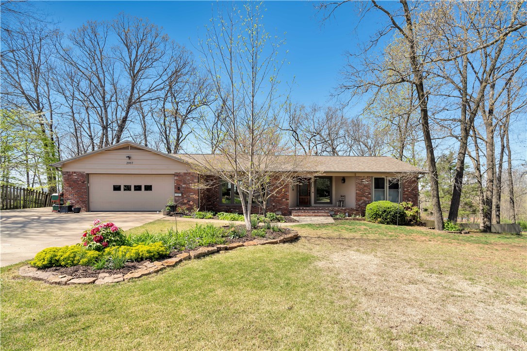 Welcome Home to this beautiful home w/tree-shaded yard! You are greeted as you enter with lots of light, expansive windows & lovely white oak hardwood floors. Spacious rooms open up to each other & highlight the living spaces. The living room is anchored by a beautiful fireplace w/woodburning insert & walnut mantle. The kitchen has been thoughtfully remodeled w/attention to detail. Large den adjacent to LR. Primary BA remodeled & custom built-inās in ownerās closet. Lots of attention to detail with upgrades by this owner. Several windows have been replaced w/Pella windows, upper & lower decks, lots of extra storage, and more! Roof replaced in 2020, garage door opener replaced in 2021, HVAC replaced in 2023. Too many upgrades to list. Donāt miss the opportunity to preview this wonderful home!