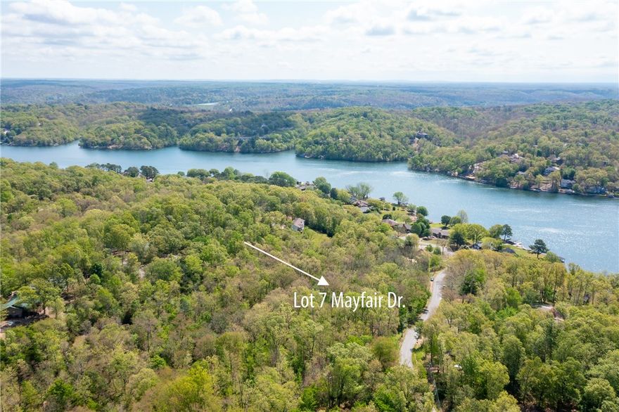 Beautiful building lot minutes from Lake Windsor Boat Ramp, Tanyard Creek Trail/Park, and the Bella Vista Country Club. And don't forget all the other amenities Bella Vista has to offer golf, biking and hiking trails , nature walks, work out-centers, swimming pools, and restaurants.