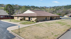 A great office building located in the medical district of Russellville. Building would ideally cater to the needs of medical professionals and patients alike. Building is 9,104 square feet, 34 parking spaces with 18 on one side and 16 on other. This building could be partitioned and made into multiple offices.