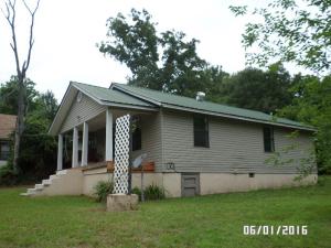 Great location close to schools and work on Hwy 64 in Hartman! Secluded feel, covered front porch with swing, metal roof, all kitchen appliances, hardwood floors, large laundry room and 1.6 acres make this a heck of a good buy. Call for your appointment to see this one today!
