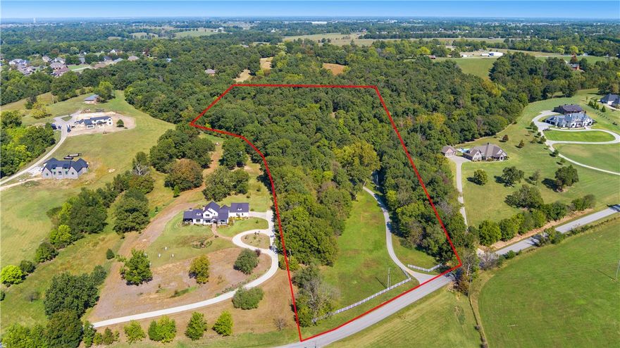 Located in one of the most sought-after areas in Northwest Arkansas, this 14-acre property is positioned in the heart of the Ozarks, offering a serene setting with multiple prime building sites. The estate includes two tranquil ponds and a spacious pole barn, making it perfect for those seeking privacy and space to grow. The recently remodeled 4,032 sq. ft. home boasts 13 rooms, including 4 bedrooms, 3.5 baths, and features breathtaking views from every angle. The updated kitchen and two modern wood stoves add warmth and convenience. An attached mother-in-law suite, complete with a charming stone fireplace, provides additional living space, while a large, fully finished walkout basement serves as a self-contained apartment—both of which come fully furnished. With its blend of natural beauty, comfort, and versatility, this property offers endless possibilities, whether you dream of enjoying the existing home, building additional residences, or simply savoring the peace and privacy the land provides. Also see 1289878