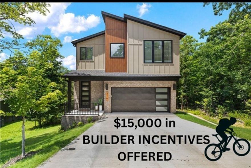 Now offering $15,000 in builder incentives! Modern city vibes in the Heart of Bella Vista with The "Back Forty" MTB system running behind the property and only 1.3 miles to Tanyard Creek.
New contemporary home that blends clean design with comfort and functionality. Surrounded by mature trees and tucked into a quiet street, this home offers the perfect balance of privacy and style. 

Step inside to a bright and open layout with sleek finishes and an airy feel throughout. The main level is designed for entertaining, while all four spacious bedrooms are upstairs, keeping your personal spaces tucked away.

Enjoy coffee or unwind at the end of the day on the back deck with wooded views — no neighbors behind you, just trees and tranquility.

Convenient location for trails, lakes, and everything Bella Vista has to offer, this home is ideal for those who want modern design with access to outdoor living.

Comes with a standard builder one year warranty.