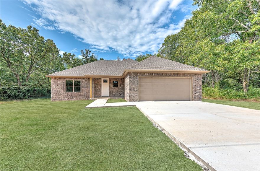 $5000 Closing costs paid from Preferred Lender!  Welcome to this beautifully designed new construction home featuring 2 bedrooms, 2 baths, plus an office situated on a level lot in the heart of Bella Vista. The open floor plan highlights a spacious living area with modern finishes, a cozy fireplace, and abundant natural light. The kitchen boasts custom cabinetry, stainless steel appliances, a large island, and quartz countertops, making it perfect for both daily living and entertaining.

The primary suite offers a private retreat with 2 walk-in closets and a stylish bath with dual vanities and a walk-in shower. A dedicated office provides the flexibility for remote work or hobbies. Outside, the flat lot offers easy access, low maintenance, and plenty of potential for outdoor enjoyment.

Additional features include a 2-car garage, energy-efficient construction, and a prime location close to trails, lakes, golf, and all the amenities Bella Vista has to offer