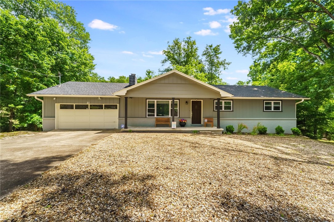 Privacy, possibilities, and peace of mind come together in this beautifully maintained 4bed, 3bath home located on a quiet cul-de-sac. Set on two lots totaling 0.84 acres, this property offers wooded privacy, nature views and access to nearby trailheads. The main level features an updated kitchen with granite countertops, stainless appliances, hard surface flooring throughout, a spacious living room with wood fireplace, and two fully updated bathrooms. The finished walkout lower level includes a bedroom and full bath, plumbed and ready for a wet bar or kitchenette, workshop/storage space—ideal for multigenerational living, a home business, or lower level airbnb. Major upgrades include a 2019 roof, 2022 HVAC and water heater, new windows, fresh paint, privacy fencing, gutters and guards, improved drainage, security cameras to stay, this move-in ready home has room to live, grow, and invest in your future. This is more than just a home—it’s a move-in-ready opportunity to create the lifestyle you’ve been looking for!