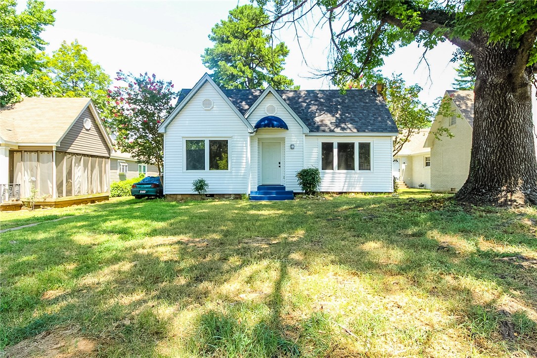 Adorable recently updated home in desirable neighborhood of Fort Smith! New siding in 2025, new roof 2025; new HVAC 2025. Original hardwood floors have been refinished, tons of "Creature features" like built ins, spacious closets. Wood Burning fireplace in living room is currently capped at the top - but doesn't take away the charm! Formal Dining room with built in china hutches; all appliances and washer and dryer convey. Huge pantry with stairway leading to attic!