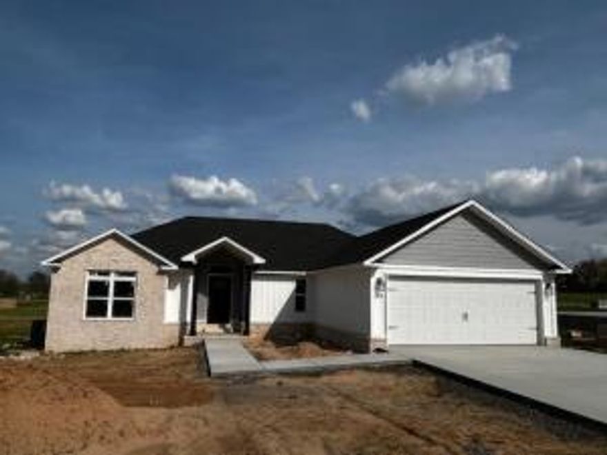 MOVE-IN READY! efficiency and design in mind in this new 3 BR, 2 BA brick home with hardwood flooring, ceramic tile and quartz countertops in kitchen and bathrooms.  Just over 1600 sq. ft., this split floor plan features a master suite with a well-designed master bath--whirlpool tub, walk-in shower, separate toilet, large walk-in closet and a linen closet!