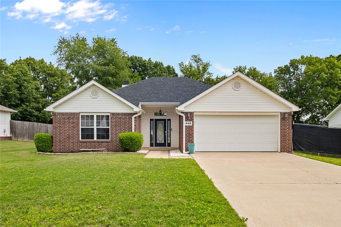 Pristine! Priced under appraised value! HUGE backyard with mature trees and privacy. Great location! This exceptionally well kept, and beautifully updated home has a great layout and lots of natural light! This home is move in ready! The living room has high ceilings and a wood burning fireplace with updated tile surround! Recent upgrades include vinyl plank flooring throughout, no carpet! Granite countertops in kitchen, updated primary bathroom, new paint, new roof (2022), New HVAC (2024), New appliances (2020). The kitchen has a corner sink with 2 windows overlooking the beautiful backyard, updated backsplash and a pantry! Lots of extra storage with walk in closets in all the bedrooms and 2 extra linen closets! The huge, fenced backyard has a big patio and mature trees for extra privacy! Great location! Bentonville schools! Close to shopping, dining and not far from the Walmart Home Office, parks, trails and so much more!
