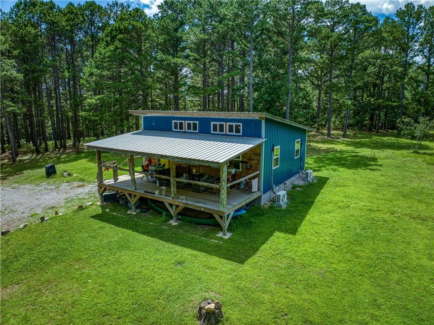 Tucked away in the heart of the Ozarks, 190 MC 6041 offers a peaceful escape surrounded by nature. This private retreat sits on a quiet, wooded lot with mature trees, abundant wildlife, and the soothing sounds of the forest. Step outside to enjoy the fresh mountain air, star-filled skies, and quiet mornings filled with birdsong. The land rolls gently with natural beauty in every direction, ideal for exploring, relaxing, or simply unwinding in peace. Whether you're watching deer pass through the trees or enjoying a quiet sunset from the porch, this property invites you to slow down and reconnect with the land. Just a short drive from the Buffalo National River and countless outdoor adventures, this is your chance to own a slice of unspoiled Arkansas wilderness.