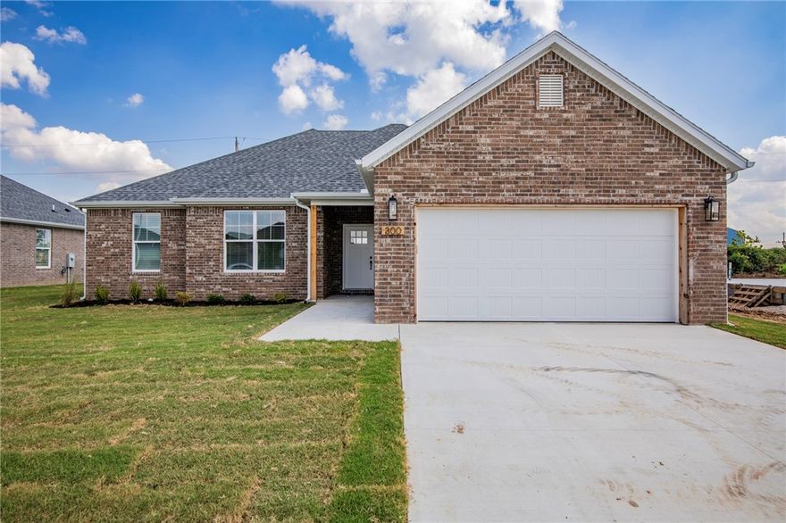 Experience contemporary comfort in this stunning new construction located in the heart of Gentry, Arkansas. Designed with a sophisticated eye, this home features an open-concept layout that perfectly balances high-end entertaining with effortless daily living. The heart of the home is a spacious chef’s kitchen, boasting a large island with designer pendant lighting and a dedicated pantry—offering a sleek, functional space that serves as the ultimate gathering spot.

up to $3000 preferred lender incentives and $5000 Builder allowance!