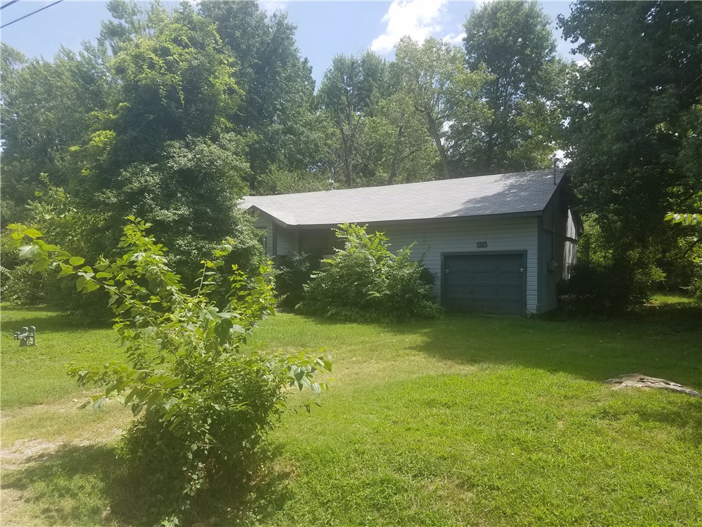 Location! Location! Location! Great home for a Fixer Upper or investor wanting to be right next to the University of Arkansas. Available for immediate showings. Home requires significant repairs. Home is sold "As Is".