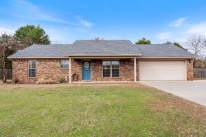 Welcome to this beautifully maintained 3 bedroom, 2 bath home in Roy Acres Estates in Pottsville! With fantastic curb appeal, this home is as inviting outside as it is inside. The HVAC was replaced in July of 2024 and the roof was replaced in 2022!! Inside, you'll find a neutral color palette throughout, from the paint to the floors to the countertops, creating a timeless and versatile look that compliments any style. This home also features an additional parking pad off of the driveway, a spacious 24 X 30 shop, and a camper/RV cover - ideal for storage, hobbies or housing recreational vehicles. The covered back porch offers a relaxing space to unwind or entertain. Washer and dryer to convey! This home is move-in ready and packed with extras - don't miss your chance to see it! Call today