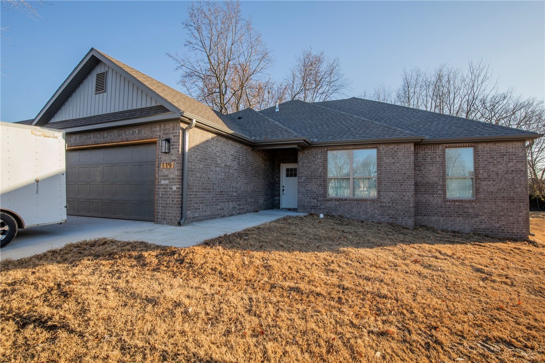 Beautiful new home on corner lot close to schools, parks, and restaurants in rapidly growing Centerton! Centered around an open kitchen / living area, this split floor plan features four bedrooms, two bathrooms, a gas log fireplace, and a large covered back porch. Dream kitchen has a center island, corner pantry, gas stove, real hood vent, and stainless appliances. All solid surface floors!