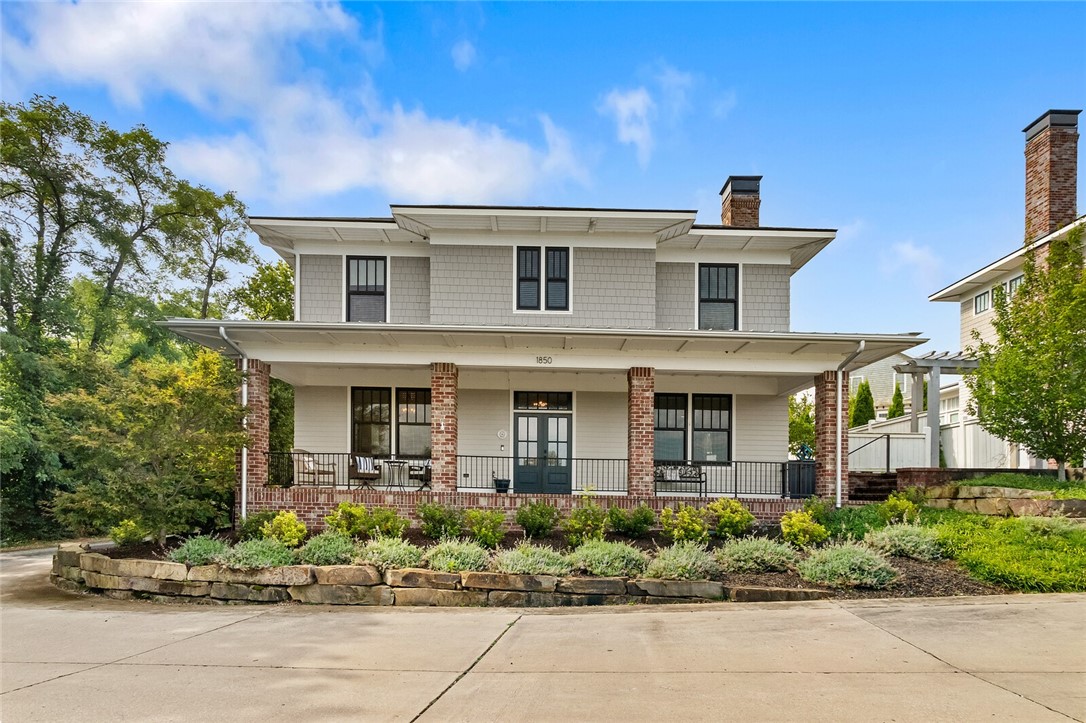 The American Craftsman FourSquare is a timeless design with incredible details. The front porch alone makes this home a showstopper. Overlooking the Nature Area and the future razorback greenway, with a quiet private alley as your streetscape, allows you the utmost in privacy. Open floor plan designed for entertaining. Four bedrooms all upstairs making for an efficient use of space in this size home. Media room is located on main level with full bathroom right off of it could be used as main level master. Custom storage built in the garage. Extra parking space around back. One of the very few houses in Mission heights with a true fenced in yard. You won't want to miss this one.
