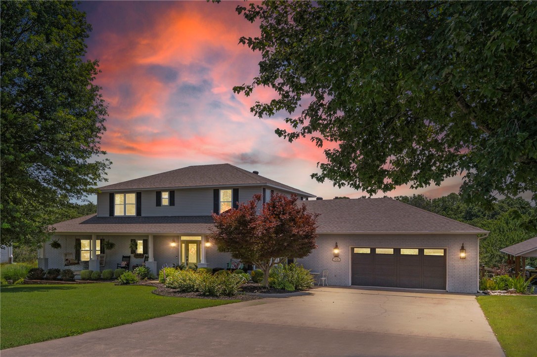 Luxury, lifestyle, and location converge in this beautifully reimagined estate featuring a guest house, heated shop with RV bay, and pool. Set on 2.10 acres, this 5BD/4.5BA retreat offers nearly 4,000 combined sqft of elevated living, with two living rooms, two fireplaces (wood-burning & electric), and dual primary suites—one on the main level with a spa-worthy en-suite and expansive walk-in closet. Designer renovations shine throughout the kitchen, dining, living, pantry, and laundry areas. Rich white oak hardwoods, a new roof, updated Culligan water system, and well pump add peace of mind. Outdoors, enjoy a 15x30 semi-inground pool, full-length composite deck, and a heated 25x45 workshop with RV bay (2022). A luxe 605 sqft guest house with private entrance, full kitchen, and bath is perfect for visitors or premium rental income. Oversized 2-car garage refined finishes throughout. Located just 4/10 mile from Back Forty Trail!This is more than a home—it’s a lifestyle. Video tour and virtual tour available!