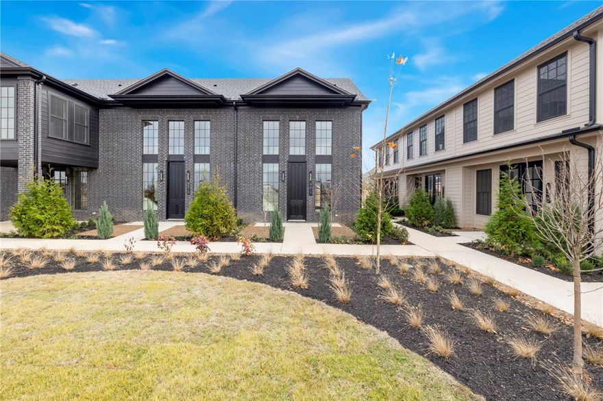 Discover luxury living in the heart of Rogers. This brand-new 2-bed, 2-bath townhome offers premium design, high-end appliances, and sophisticated finishes throughout. The open-concept layout features upscale cabinetry and fixtures, a spacious living area with a fireplace & filled with natural light, and beautifully appointed bedrooms and baths designed for comfort and style. 

Location is unmatched. Enjoy walkable access to the Walmart AMP, Razorback Greenway, Topgolf, and Pinnacle Hills Promenade—plus some of Northwest Arkansas’ best dining, entertainment, and outdoor amenities just minutes from your door.

Perfect for those seeking modern convenience, luxury details, and an exceptional lifestyle in one of Rogers’ fastest-growing districts. This is low-maintenance, high-style living at its finest.
