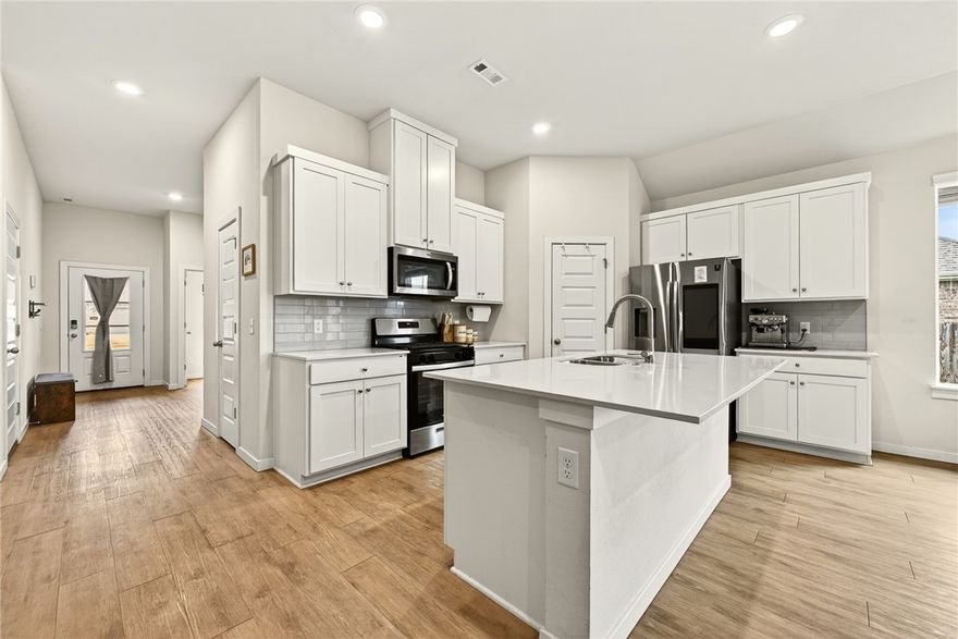 Check out this 4 bedroom home in Farmington all on one level! The Laredo plan is a favorite, and With 4 bedrooms, 3 bathrooms, and an office, this home has a ton to offer! With added smart home technology features allowing various lighting, garage, door lock, and thermostat controls, you will have easy access and added safety. The open kitchen and living room offer plenty of space to entertain, and the spacious foyer is an inviting touch. With luxury vinyl flooring throughout, full brick exterior, covered back patio, and upgrades throughout, this home is a must see! Make sure and take note of the amazing view of Mt. Kessler in the backyard!