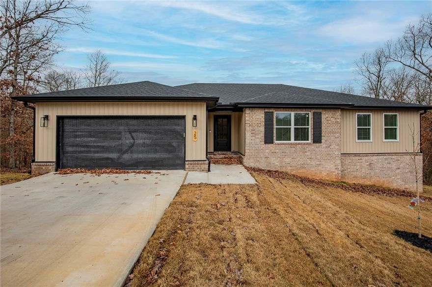 Move in Ready!!!! Gorgeous New Construction just a golf cart ride away from the Highlands Golf Course!! The builder & designer went above and beyond on the details!! So much natural light pouring into the living room, fireplace framed by built in's and floating shelves. Open concept and kitchen that is perfect for
entertaining with a large walk in panty. Master bathroom with custom tile shower and free standing tub.
The bathroom leads into the large master closet......which leads to the laundry room for easy access to
hang up your clothes straight from the dryer. Beautiful modern light fixtures, plumbing fixtures, and
hardware. Custom cabinetry & woodwork with Quartz countertops. Smart Thermostat for Energy Efficiency. The exterior has a Ring Doorbell, custom cedar shutters, covered deck, & attached 2 Car garage. Close proximity to the Interstate, Bike/Hiking Trails, Rec Centers,Golf Courses, and Lakes!!