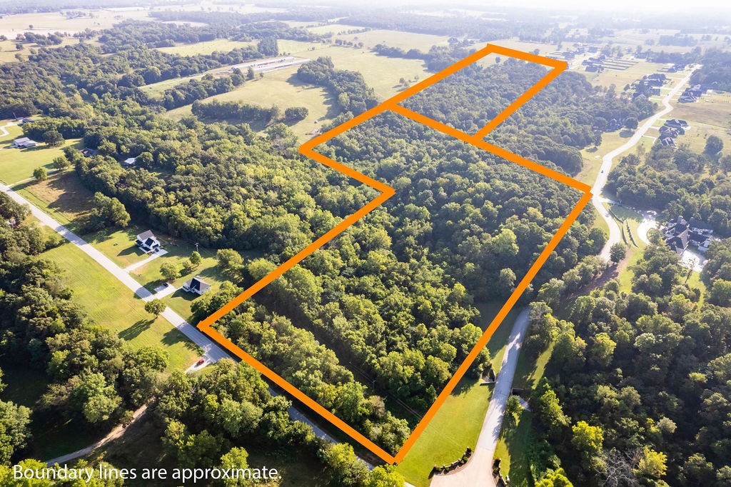 Great opportunity for your dream home on a farm OR to split into Estate-sized building lots. Nearly 39 acres made up of two adjacent parcels: 18-13955-000 (17.47 acres) + 18-10963-000 (21.37 acres). Easy commute to Highway 412 and Interstate 49. Water and electricity on site. Septic needed. All utilities to be confirmed by the buyer. Would consider subdivide in the right situation.