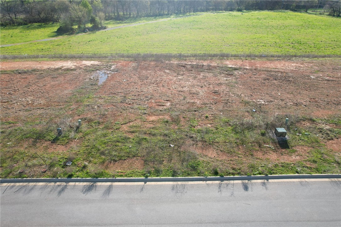 Secure your piece of Bentonville's booming future with this exceptional building lot in a new subdivision. One of only eight premium lots available in this thoughtfully planned community.
The Centerton corridor experiences unprecedented growth with new businesses and developments transforming the landscape monthly. This strategic location offers easy access to top-rated schools, major employers, and premier shopping while maintaining strong property value growth.
This ready-to-build lot sits perfectly positioned with utilities available, minutes from downtown Bentonville with seamless I-49 corridor access. You'll enjoy suburban tranquility with urban accessibility.
Don't miss this investment opportunity in Northwest Arkansas' growth story. With only eight lots available, secure your place in this promising area today.