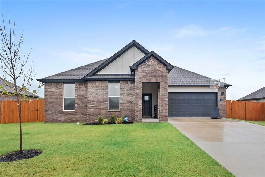 Immaculate home with all the upgrades! This beautiful home has the perfect 4-bedroom layout with an open floor plan! Built in 2024, this home is like new in perfect condition. No carpet here, luxury vinyl plank flooring throughout the home! High ceilings throughout! The kitchen has a huge island with bar seating, gas range, pantry and plenty of cabinet space. The open kitchen, dining, living room layout is perfect for entertaining. The spacious dining area can accommodate a large table. The living room has a fireplace and lots of windows to bring in natural light, it is spacious and can easily fit a large sectional. The primary bedroom is a great size and has private bathroom with a tile walk in shower, double sinks and a HUGE walk-in closet! The desirable split bedroom layout has 3 more bedrooms on the other side of the home and another bathroom with double sinks! Large, fenced backyard with a covered patio! Great location, close to the Pea Ridge schools.