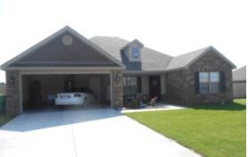 Rural Development Eligible. Walk to Bentonville West High School from home. This beautiful home is perfect for a first-time home buyer! Great split plan lay-out with vaulted ceiling in living room. Beautiful cabinets in large eat-in kitchen. Jacuzzi tub, shower in master bath, and large walk-in closet in master suite. A lot of house for the price with privacy fence around back yard with patio, landscaping in front yard.