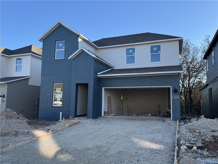 The Marvelous Mitchell plan in Pine Hollow by D.R. Horton! This community offers two-story homes with spacious living areas, perfect for entertaining and everyday comfortable living. This home features 4 bedrooms, 3 full baths, & a game room upstairs! You'll enjoy a beautiful modern electric fireplace with a poplar mantle in the living room! Full oak Tread Staircase with black modern handrails-Bathroom 1 will be tile flooring- Beautiful Wood Laminate click LVP first and second floor! In the kitchen, you’ll find stunning quartz countertops, tile backsplash, and a gas range. The primary bedroom has an ensuite complete with quartz countertops, dual sinks, freestanding tub and a walk-in shower with tiled walls! Ceiling fans in the bedrooms, living room and game room! Home exterior features painted brick and Hardie® siding (per plan) with a covered patio (per plan). The programmable thermostat allows you to effortlessly control your environment with the touch of a button! Taxes and parcel TBD.