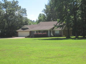 More privacy than you could ask for and close to town! Beautiful 3 acres with a cozy 3 bd 2 ba home in excellent condition. Sq footage per owner.