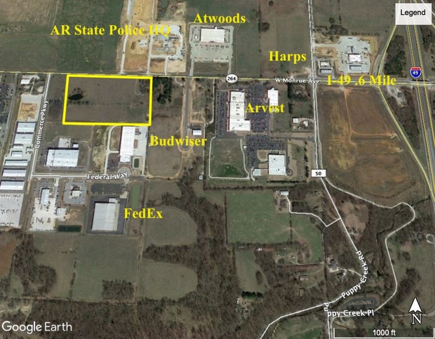 14.93 acres on Hwy 264 with 1019 ft of frontage. Where can you find a better place for your business? Can't be found. All utilities except sewer. Across the street from farm supply store. Owner will consider splitting property or a build to suit. No value given to home.