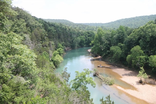Introducing a rare opportunity to own one of the Ozark's most unique properties! Riverfront retreat, built by original owner Bill Wilson of Wilson Combat, sits on 33 prime acres in the Ozark Mountains of NWA. In this home, you will find the same quality, custom design & attention to detail that has made Bill Wilson an industry Elite in firearms. This sportsman's paradise appeals to hunters, gun enthusiasts, & anyone who enjoys nature & the outdoors. Stunning views overlooking The Kings River.