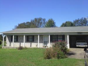 Nice home in the country with an acre of land for a large garden. Covered front porch, carport, living, dining and beautiful kitchen cabinets. Clothes washer and clothes dryer convey. Large wooden deck on the back of the house for Bar-B-Q's and birthday party's. Formally three bedrooms. Can be easily converted back to three bedrooms.