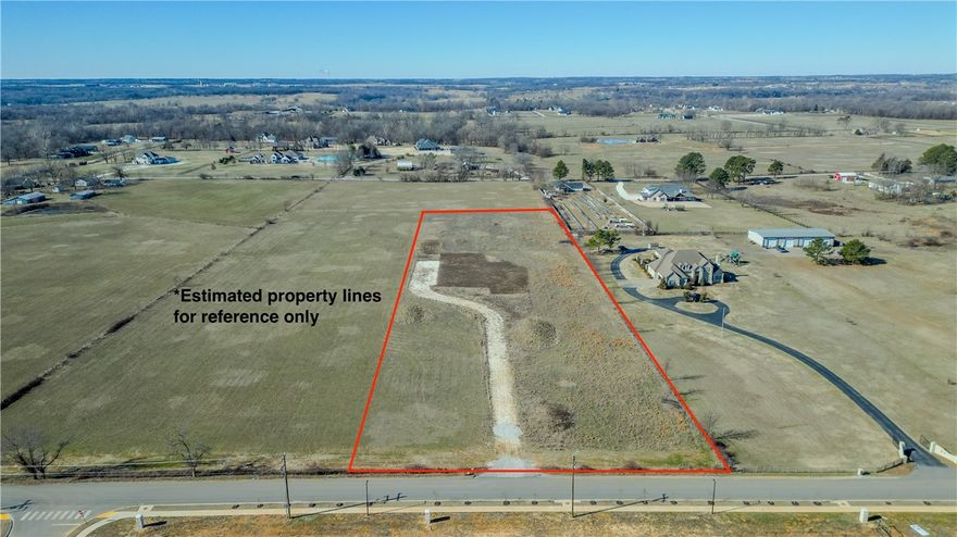 Build your dream home on 4.88 acres of prime land! Beautiful flat lot located in a highly sought-after Bentonville area off Pleasant Grove Rd. Bentonville school district. Survey has been done and corners have been marked by surveyor. Seller currently working on getting water line.  15 minute drive to XNA airport, 11 minutes to Pinnacle Hills Promenade, and 15 minutes to Walmart Home Office. Experience the freedom to design and live the way you want without the restrictions of HOA or POA. Don’t miss out. Call to schedule a private tour.