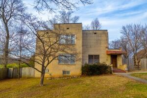 This turnkey, remodeled home is one of the coolest in town! Charming interior featuring shiplap accent walls, designer hardware, polished hardwood floors throughout and a gas fireplace. Many recent updates including a new roof in 2021, kitchen update, lighting updates throughout, upstairs bathroom, With over 2,000 sq ft, this beautiful home boasts 3 bedrooms, 2 full bathrooms, circle driveway and possible 4th bedroom in the basement. You will love the large deck to enjoy the city skyline views and mountains in the distance, large back yard and nice landscaping with several dogwood trees.