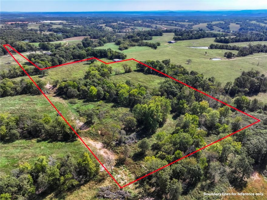 This is your chance to own your own piece of paradise! Breathtaking views and unmatched privacy. Build your dream home on 19.5 acres, complete with a picturesque pond. 30 foot wide strip on northernmost side allows for access to and from the property. With convenient access to 412, you can be in Siloam in five minutes. No covenants! Mobile homes allowed!