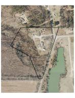 Great property, fenced and ready for you business. Great for a go cart track , holding area for equipment along with many other uses. Call for details. autos and mobile home DO NOT CONVEY