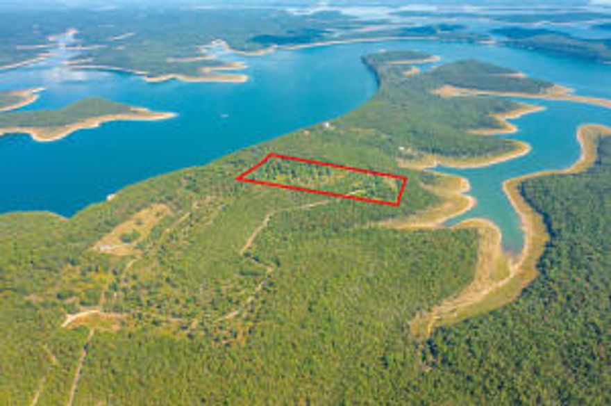 Lake View, just a short drive to 125 Marina.  Great building site.  South line joins U.S. Corp of Engineers.