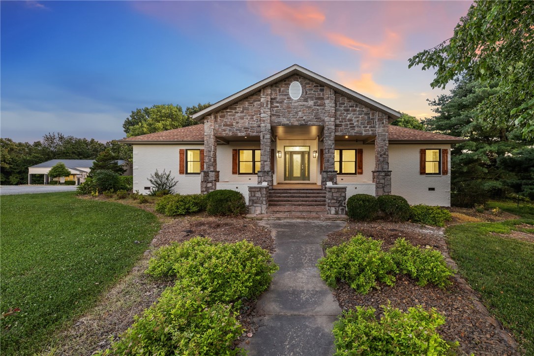 Welcome home to unparalleled luxury and privacy! This stunning, completely reimagined estate is a true masterpiece, meticulously renovated inside and out. No detail has been overlooked, from the brand-new HVAC and water line to the exquisite finishes throughout every inch of the home.
Nestled on over 9 sprawling acres, this property offers a serene oasis with an incredible outdoor living space. Picture yourself relaxing by the sparkling in-ground pool, beautifully encircled by custom stonework, or entertaining guests from the convenience of the adjacent cabana. Enjoy the tranquil views of your private pond, adding another layer of natural beauty to this expansive estate.
Adding to this impressive offering is a versatile shop building featuring a full, private apartment, perfect for guests, extended family, or even rental income. This isn't just a home; it's a lifestyle waiting to be discovered.