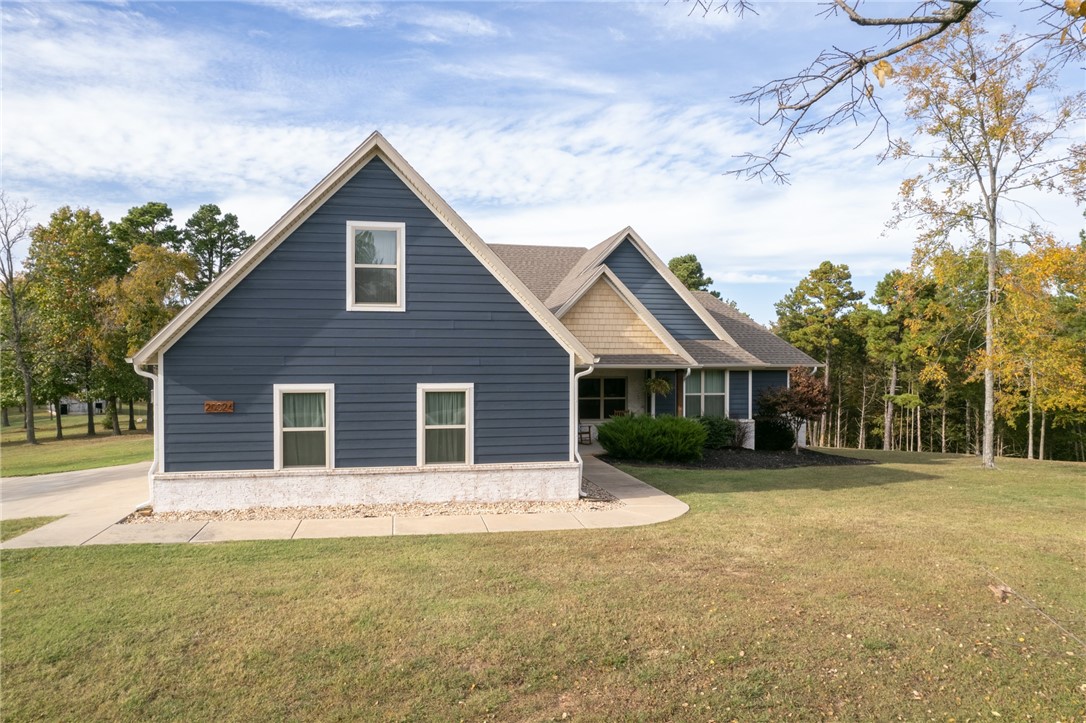 Discover your daily vacation retreat in the rolling hills just moments away from Rocky Branch Marina. This meticulously crafted, custom-built home has many quality features. Sunlight floods the spacious open living area, seamlessly connecting to the outdoor screened entertainment space. Immerse yourself in the the saltwater pool, complete with a tanning ledge and captivating light features. Beautiful views of your century-old barn and 4.78 acres of land surround the home.
Step into a one-of-a-kind farmhouse that encompasses three bedrooms, a home office, and a bonus room. Enjoy the warmth of the double-sided fireplace, surrounded by built-ins, and be captivated by the vaulted ceilings adorned with rustic wood beams. This extraordinary residence ensures both high-speed internet and surround sound for your convenience.
Make your way home to this exceptional custom-built farmhouse mere minutes from the enchanting Beaver Lake, where every day feels like a blissful getaway.