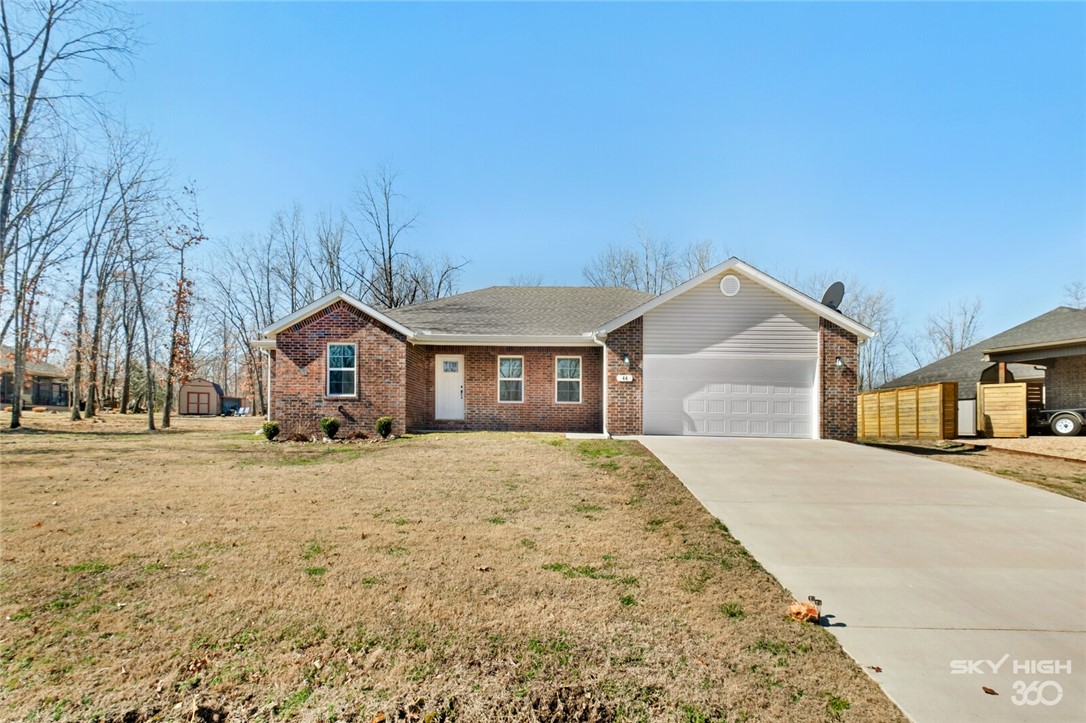 Beautiful neighborhood of newer construction homes with convenient access to I-49. This 3 bedroom plus office, 2020-built home has an open, split floorplan with treyed ceilings and beautiful floors. Enjoy the unobstructed view of your second lot (.30 acres) from your comfy covered back patio! Both lots are so flat there is no need to worry about rolling out your backdoor into a ravine. Fridge, washer, and dryer all convey!