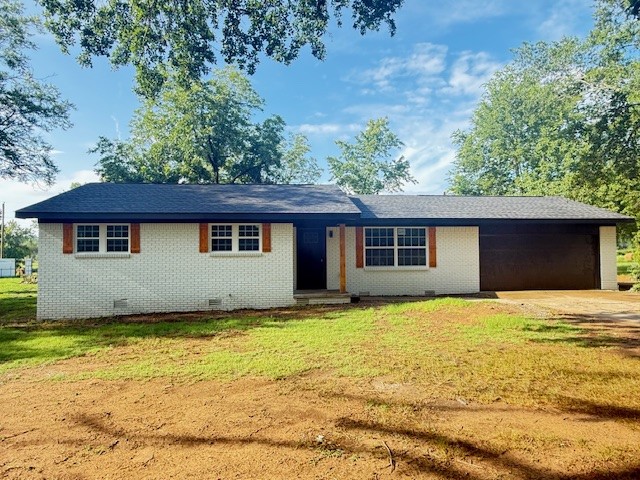 Beautifully remodeled home with a private setting in Knoxville! 1.73+/- Acres, 1878 sft+/- 4 bed 3 bath w/master suite, laundry room, living room and dining area, split floor plan andquartz counters and large pantry. ZERO DOWN eligible and move in ready! Spacious 2 car garage, NEW: HVAC, roof, windows, attic insullation, waterproof luxery vinyl flooring, 2 electric fireplaces, ceramic tile, new sheetrock, paint in and out, new Samsung kitchen appliances, new plumbing and electirical fixtures, vapor barrier, tons of ENERGY EFFICIENT LED lighting inside and outside! Just a short drive to a public ramp on the lake, beautiful views of the mountains and large trees! Huge yard with well house and outbuildings and a concrete pad!! Nothing in this price range compares, call for your private showing today!!