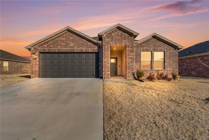 Welcome home to this beautifully designed single-story residence offering four bedrooms, two bathrooms, and an expansive open living area perfect for both everyday comfort and effortless entertaining. The heart of the home is the open-concept kitchen, featuring quartz countertops, stainless steel appliances, a gas range and an oversized pantry. The split floor plan provides added privacy, with a spacious primary suite that includes a walk-in closet and a bathroom with a double vanity. An oversized laundry room adds convenience and extra storage space. Step outside to enjoy the covered patio and peaceful backyard with no rear neighbors—ideal for relaxing or hosting guests. Located in a prime Rogers location close to shopping, dining, and amenities, this home offers both comfort and convenience. Homes in this desirable neighborhood don’t last long—schedule your showing today.