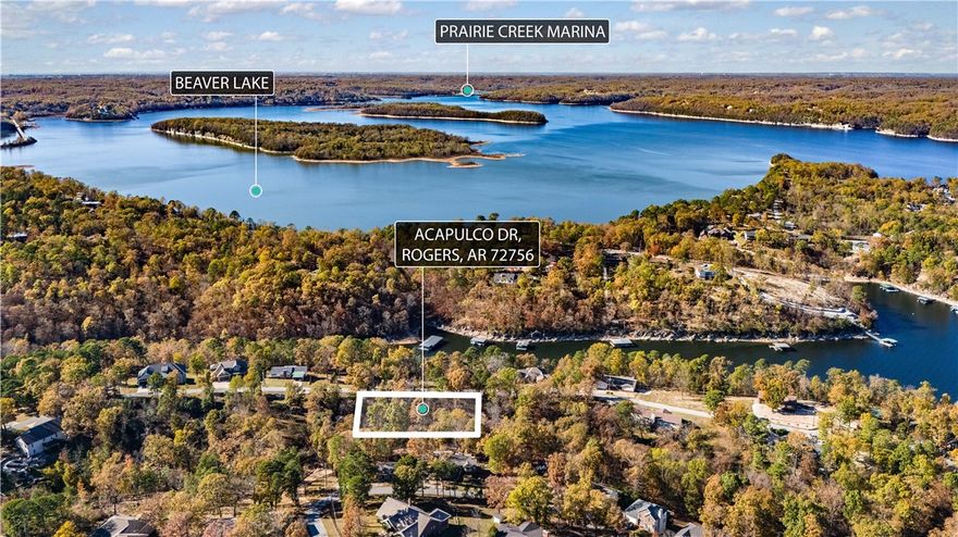 Build your dream lake home on 3 lots  of .65 acre  total. Although this property is not lake front, the lake is visible and is easily accessible. Located in a fantastic neighborhood with covenants are in place. Just 15 min to downtown rogers and 5 min from Prairie Creek Marina. Lot 33,34 & 34 are contiguous Parcel IDs : 15-04005-000 and 15-04004-000 will not be sold separately.