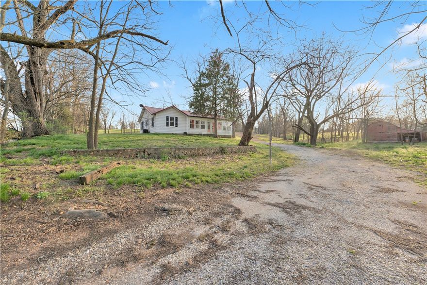 Opportunity meets space and location with this incredible fixer-upper on 2 acres in the heart of Northwest Arkansas! Just minutes from I-49, Walmart, and top local amenities, this property offers unmatched convenience and long-term value. Whether you’re an investor or a homeowner ready to customize every detail, this is your chance to bring your vision to life. With the right touch, the possibilities here are truly endless! The land and location make this a rare find!