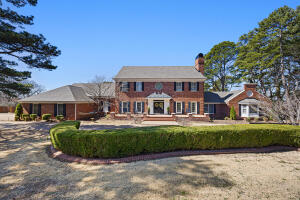 Discover timeless elegance in this custom-built Georgian home, offering 5 bedrooms, 4.5 baths, and a spacious 1.43-acre lot. High-end renovations to the kitchen in 2024 as well as a new roof (2025), this property showcases stunning wood flooring, a luxurious master suite, and 4 inviting fireplaces. The second floor features additional space perfect for family living. Outdoors, enjoy the in-ground pool, pool house, and a circular drive complementing the 3-car garage. A refined blend of classic charm and modern updates awaits!