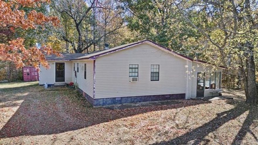 THE SUNSETS ARE SPECTACULAR! HUNTERS PARADISE!!! 10 ACRES THAT JOIN THE NATIONAL FOREST AND HWY 7! THIS 2- OR 3-BEDROOM HOME HAS A LARGE SCREENED IN PORCH TO SIT AND ENJOY QUIET OF COUNTRY LIVING.DEER, TURKEY, BEAR, SQUIRREL AND WILD HOGS CALL THIS LAND HOME. HOME!! IF COUNTRY LIVING IS YOUR DREAM OR HUNTING CABIN OR A GET A WAY THIS IS THE ONE YOU HAVE BEEN WAITING ON!! THIS IS LOCATED 1/4 MILE FROM ROTARY ANN REST AREA.SEE PRIVATE REMARKS
