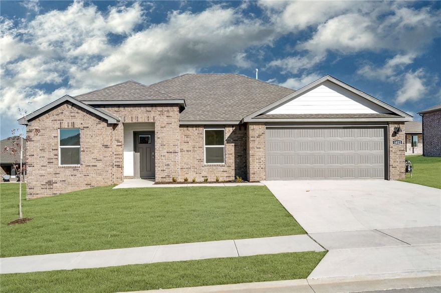 Plan in Rolling Meadows, in Pea Ridge, Arkansas! Each home in Rolling Meadows is meticulously crafted with attention to detail, creating a space that feels both luxurious and welcoming. From the moment you walk through the door, you'll be greeted by modern features and a spacious layout that caters to every lifestyle. Our homes boast premium finishes and thoughtful designs, ensuring that you'll be stepping inside your own personal oasis. These homes will be complete with LVP flooring throughout (two-story plans will have carpet on stairs and upstairs) and wood shelving in all closets, pantry, and utility room. The kitchen will have quartz kitchen counters, 36-inch cabinets, and stainless-steel appliances with a Gas Range! The primary bath will feature quartz countertops, double sinks, and a walk-in shower. Each home comes with 4-sided brick with Hardie® fascia per plan. Home will have a Garage Door Opener. Taxes and Parcel TBD.