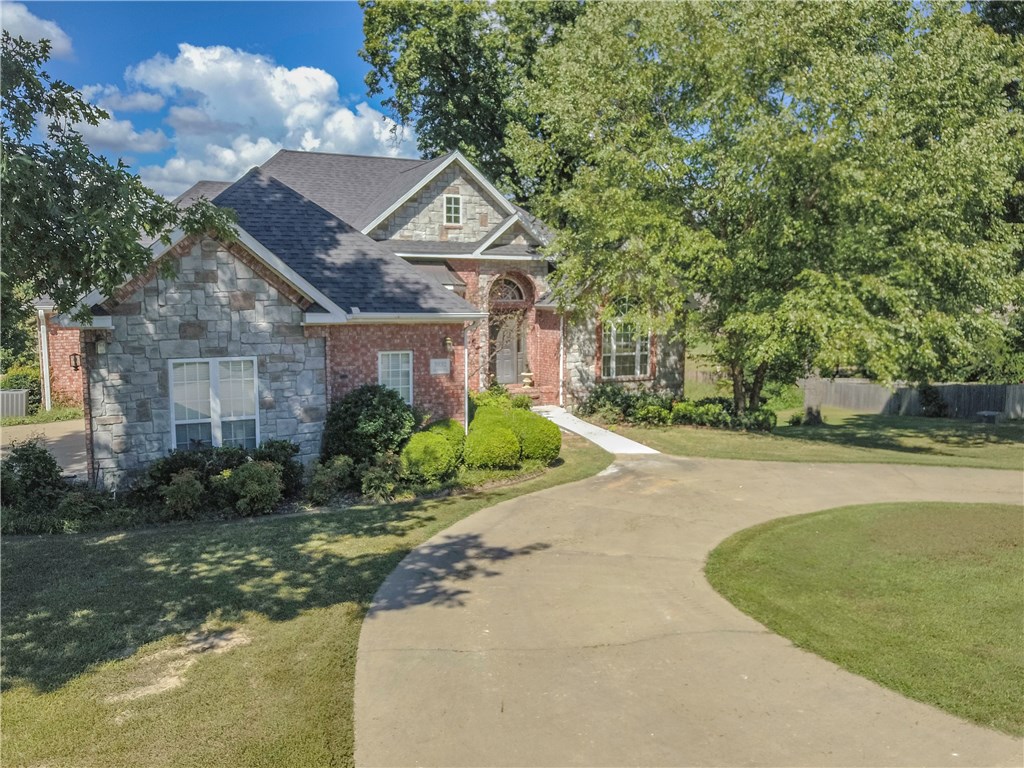 Beautiful spacious home in the desirable Del Woods Subdivision. Gorgeous new hand scraped hardwood floors and new carpet throughout the house. Step out from the kitchen to the large deck overlooking your private inground pool. Split floorplan with large living room and kitchen offers plenty of room for entertaining. Drive into your three-car garage and prepare to relax.